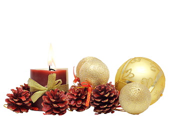 Image showing bunch of christmas decoration and candle