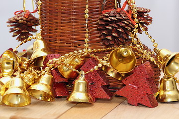 Image showing gold bells and christmas tree shaped candles