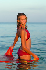 Image showing cute teen girl in the sea