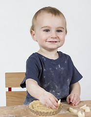 Image showing child making cookies