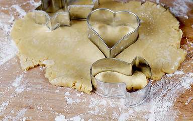 Image showing making cookies on wooden desk