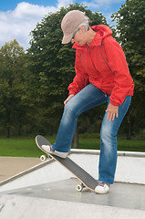 Image showing Granny on a skateboard