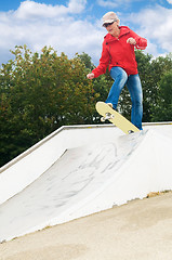 Image showing Granny on a skateboard