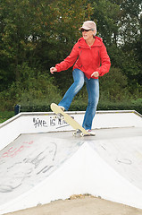 Image showing Granny on a skateboard