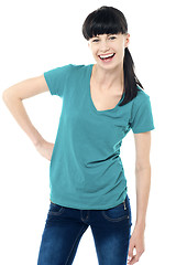 Image showing Trendy lady posing in style and flashing a smile