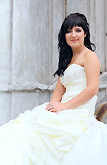 Image showing Girl in the wedding dress sitting