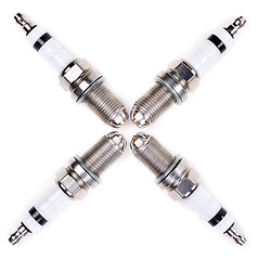 Image showing Four spark plugs in the form of a cross