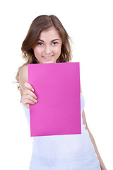 Image showing woman holding empty pink board