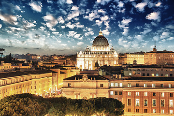 Image showing Buildings of Rome with Vatican St Peter Dome in background - sun