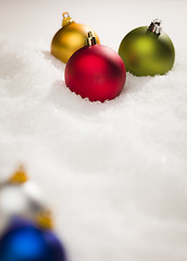 Image showing Christmas Ornaments on Snow Flakes with Text Room