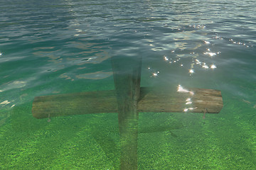 Image showing Wooden cross under water
