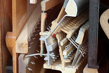 Image showing Piano mechanism gavel - string, pins and hammers 