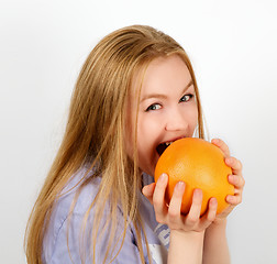 Image showing Portrait of Woman with Grapefruit