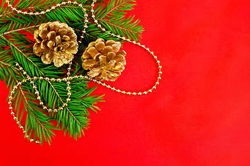 Image showing Christmas frame with golden cones