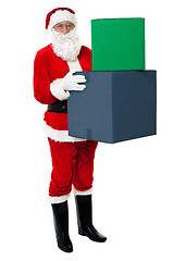 Image showing Photo of happy Santa Claus delivering gifts