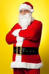 Image showing Confident male Santa posing with arms folded