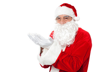 Image showing Happy Santa Claus smiling with open palms