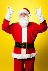 Image showing Aged Santa gesturing perfect sign with both hands