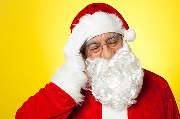 Image showing Portrait of Santa Claus suffering from headache