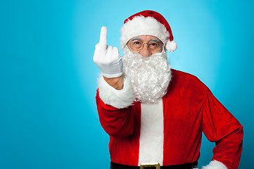 Image showing Agitated Santa showing his middle finger