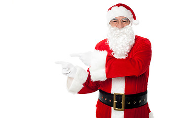 Image showing Santa pointing at blank copy space area