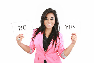 Image showing attractive young woman thinking yes or no