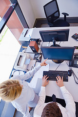 Image showing business people in a meeting at office