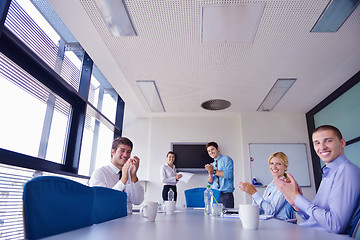 Image showing business people in a meeting at office