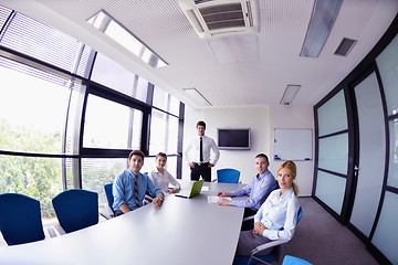 Image showing business people in a meeting at office