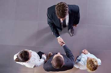 Image showing business people making deal