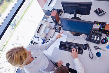 Image showing business people in a meeting at office