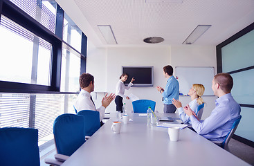 Image showing business people in a meeting at office