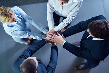 Image showing business people group joining hands