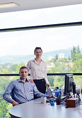 Image showing business people in a meeting at office