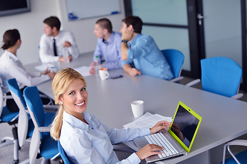 Image showing business people in a meeting at office