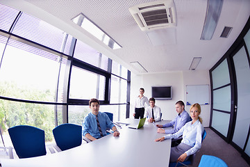 Image showing business people in a meeting at office