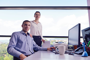 Image showing business people in a meeting at office