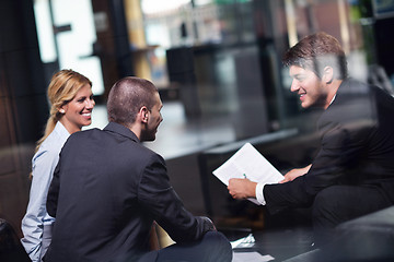 Image showing business people making deal