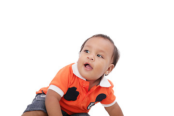 Image showing Closeup of happy one year old hispanic baby boy on isolated back