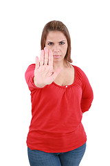 Image showing Isolated young woman stop sign, focus on hand