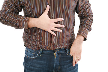 Image showing man holding his stomach in pain or indigestion 