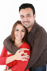Image showing Portrait of a handsome man with his arms around his beautiful wi