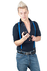 Image showing Handsome man in jeans and suspenders