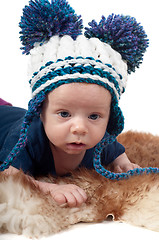 Image showing Little baby in pom-pon hat