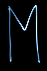 Image showing The letter M from neon light. 