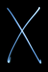 Image showing The letter X from neon light. 