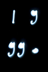 Image showing Comma, point and quotes symbols from neon light. 