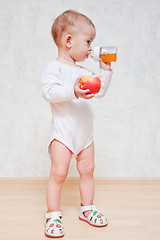 Image showing Baby girl with healthy food at home