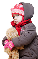 Image showing Baby in winter clothes on a white background