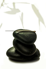 Image showing acupuncture needle on stone